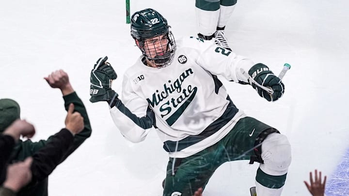 Michigan State forward Porter Martone (22) celebrates scoring a goal against Michigan during the first period of Duel in the D at Little Caesars Arena in Detroit on Saturday, February 7, 2026.