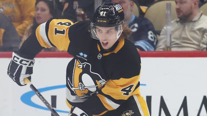 Apr 17, 2025; Pittsburgh, Pennsylvania, USA;  Pittsburgh Penguins right wing Ville Koivunen (41) moves the puck against the Washington Capitals during the second period at PPG Paints Arena. Mandatory Credit: Charles LeClaire-Imagn Images