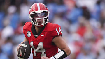 Oct 18, 2025; Athens, Georgia, USA;  Georgia Bulldogs quarterback Gunner Stockton (14) looks to pass against the Mississippi Rebels during the first half of the game at Sanford Stadium. Mandatory Credit: Brett Davis-Imagn Images