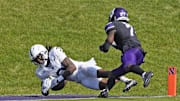 Sep 30, 2023; Evanston, Illinois, USA; Penn State Nittany Lions wide receiver Dante Cephas (3) tries to make a catch as Northwestern Wildcats defensive back Ore Adeyi (7) defends him during the second half at Ryan Field. Mandatory Credit: David Banks-Imagn Images