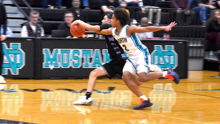 North Oldham High School point guard Rajon Pierre Rondo attempts to steal the ball in a game against Jeffersontown Wednesday, Feb. 18. Rondo is an eighth-grader averaging 13.7 points per contest. 