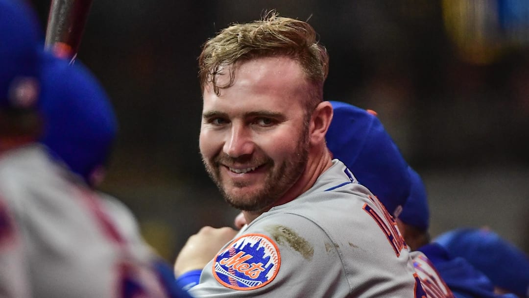 Sep 19, 2022; Milwaukee, Wisconsin, USA; New York Mets first baseman Pete Alonso (20) smiles in the dugout during game against the Milwaukee Brewers at American Family Field. Mandatory Credit: Benny Sieu-Imagn Images