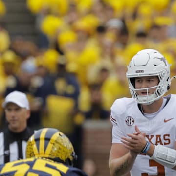 Texas Longhorns quarterback Quinn Ewers calls a play during Saturday's win against the Michigan Wolverines.