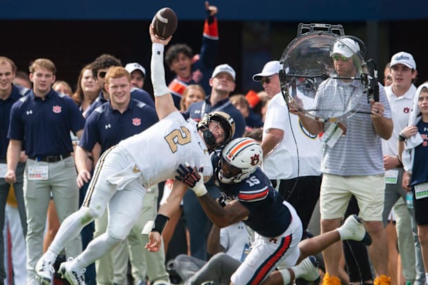 Vanderbilt Commodores quarterback Diego Pavia (2) throws the ball before he can be sacked.