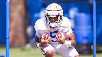 Florida Gators running back Treyaun Webb (5) runs a drill while carrying two balls during Fall practice at Sanders Practice Fields in Gainesville, FL on Thursday, August 8, 2024. [Doug Engle/Gainesville Sun]