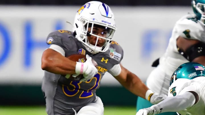 Dec 23, 2023; Honolulu, HI, USA; San Jose State Spartans running back Kairee Robinson (32) runs the ball against the Coastal Carolina Chanticleers during the third quarter of the Easypost Hawaii Bowl at Clarence T.C. Ching Athletics Complex. Mandatory Credit: Steven Erler-USA TODAY Sports