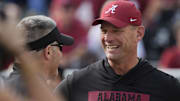 Alabama head coach Kalen DeBoer talks with Eastern Illinois coach Chris Wilkerson before the game at Saban Field at Bryant-Denny Stadium.
