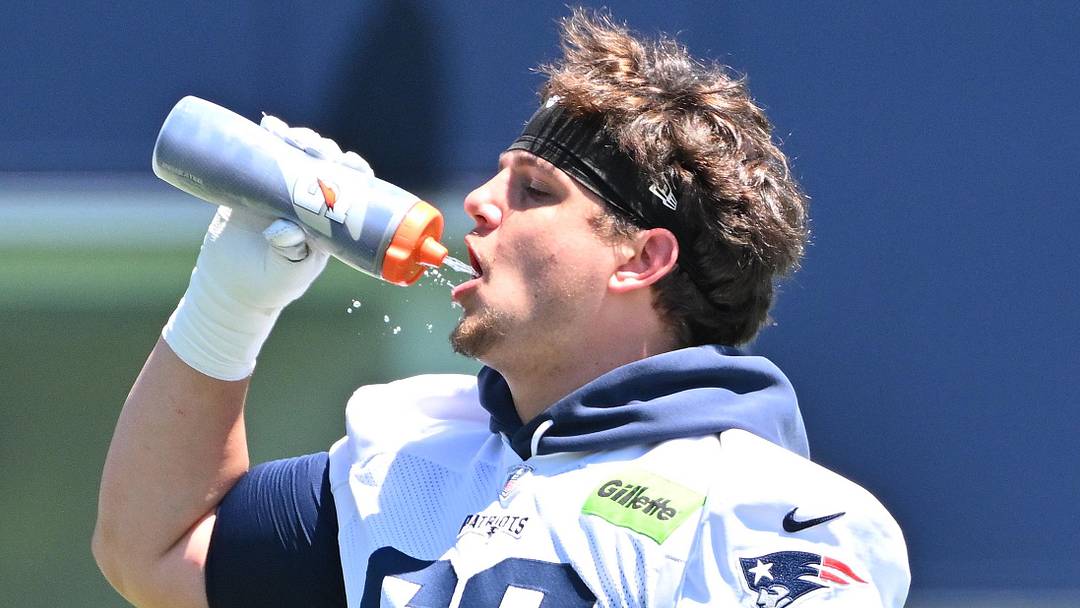 Jun 9, 2026; Foxborough, MA, USA; New England Patriots offensive tackle Will Campbell (66) gets a drink during minicamp at Gillette Stadium. Mandatory Credit: Eric Canha-Imagn Images