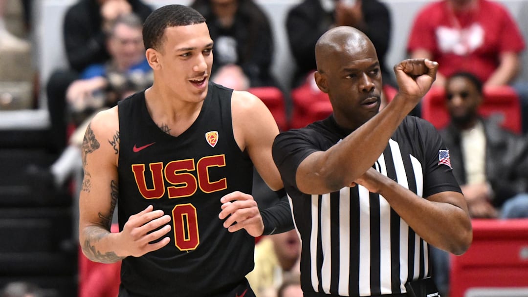 Feb 29, 2024; Pullman, Washington, USA; USC Trojans guard Kobe Johnson (0) talks with an official after being called for a foul during a game against the Washington State Cougars in the first half at Friel Court at Beasley Coliseum. Mandatory Credit: James Snook-Imagn Images
