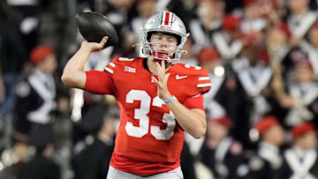 Sep 7, 2024; Columbus, Ohio, USA; Ohio State Buckeyes quarterback Devin Brown (33) throws a pass during the second half of the NCAA football game against the Western Michigan Broncos at Ohio Stadium.