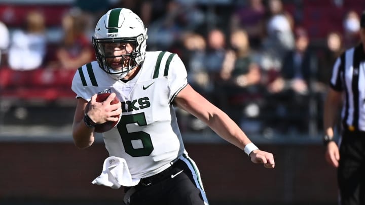 Sep 11, 2021; Pullman, Washington, USA; Portland State Vikings quarterback Davis Alexander (6) runs the ball against the Washington State Cougars in the first half at Gesa Field at Martin Stadium. Mandatory Credit: James Snook-USA TODAY Sports