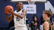 Milwaukee Academy of Science guard Jamarion Batemon (15) grabs a rebound against Shoreland Lutheran in a WIAA regional game Friday, March 1, 2024, at Milwaukee Academy of Science in Milwaukee, Wisconsin.