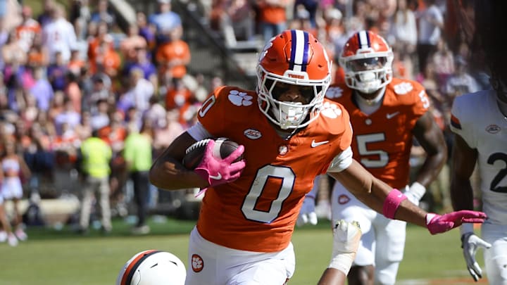 Oct 19, 2024; Clemson, South Carolina, USA; Clemson Tigers wide receiver Antonio Williams (0) runs the ball against the Virginia Cavaliers at Memorial Stadium. Mandatory Credit: Alexander Hicks-Imagn Images