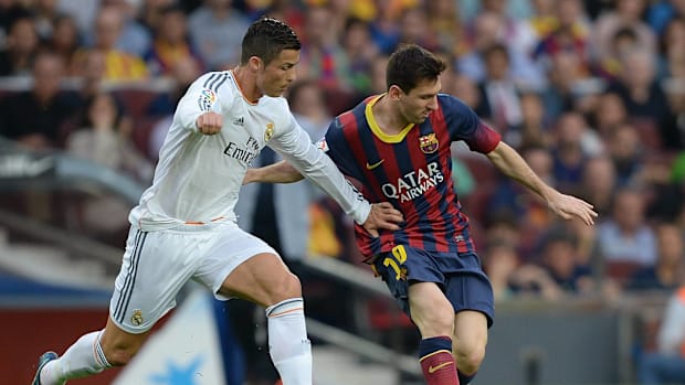 Cristiano Ronaldo and Lionel Messi in action in El Clasico.