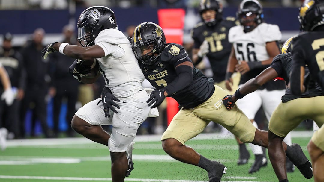 South Oak Cliff's Jamarion Phillips tackles Richmond Randle's Landen Williams-Callis during the Class 5A, Division II State Championship game on Friday, Dec. 20, 2024, at AT&T Stadium in Arlington, Texas.