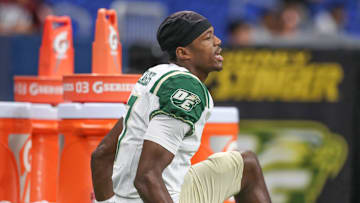 DeSoto's Ethan Feaster warms up after halftime during Friday's game at the Alamodome on Sept. 13, 2024, in San Antonio, Texas.