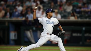 Hooks pitcher Miguel Ullola throws a pitch on Opening Night at Whataburger Field on Friday, April 5, 2024, in Corpus Christi, Texas.