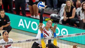 Andi Jackson fires a shot for one of her 10 kills. She earned match MVP honors in the 3-1 win over No. 3 Pitt.
