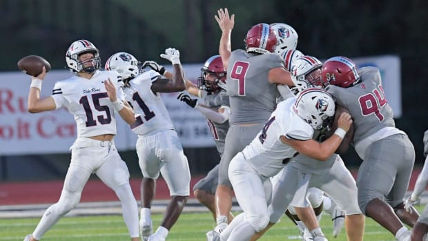 Pike Road's Cason Myers (15) passes against Prattville during their game in Wetumpka, Ala., on Thursday August 22, 2024.