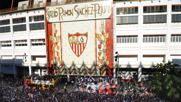 Sevilla's players celebrate after winnin