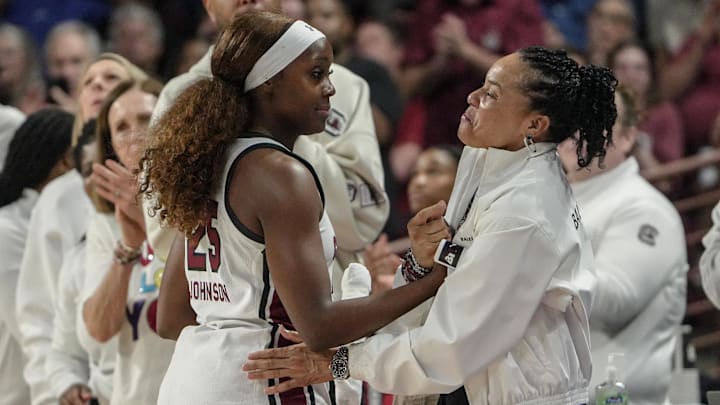 South Carolina Coach Dawn Staley greets South Carolina guard Raven Johnson (25) coming out of the game against University of Southern California Monday, March 23, 2026, during the fourth quarter NCAA Women's Basketball Tournament at Colonial Life Arena in Columbia, South Carolina.