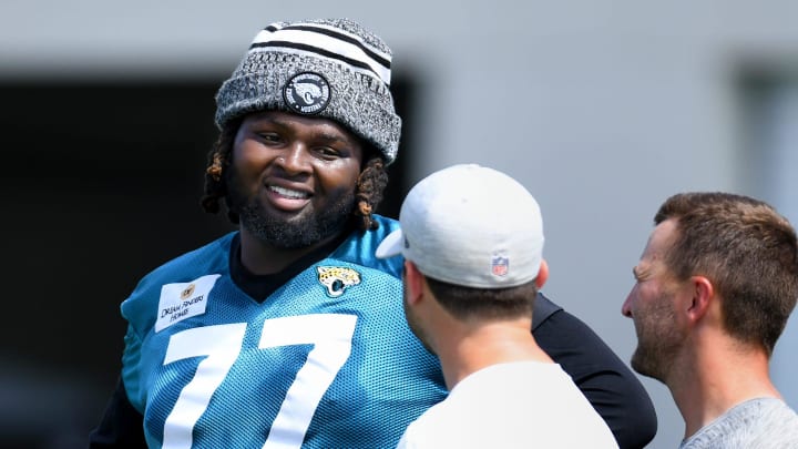 Jacksonville Jaguars offensive tackle Anton Harrison (77) on the field during the organized team activity session Monday, June 3, 2024 at EverBank Stadium's Miller Electric Center in Jacksonville, Fla.