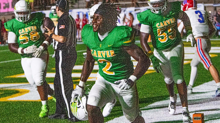 Carver's Anthony Rogers (2) celebrates a touchdown late in the first half against Vestavia Hills during their game at Cramton Bowl in Montgomery, Ala., on Friday August 23, 2024.