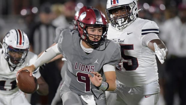 Pike Road’s Corey Tims closes on Prattville Gavin Rigdon (9) during their game in Wetumpka, Ala., on Thursday August 22, 2024