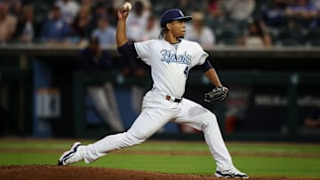 Hooks pitcher Miguel Ullola throws a pitch on Opening Night at Whataburger Field on Friday, April 5, 2024, in Corpus Christi, Texas.