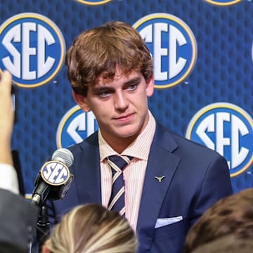 Texas quarterback Arch Manning meets with the media before his first season as the starting quarterback.