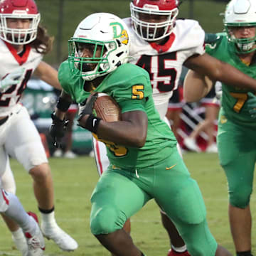 DeLand's Taihj Moore (5) breaks through the Appling County line for a long touchdown run, Friday, Sept. 13, 2024 at Spec Martin Stadium.