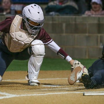 Calallen's Audryna Almaraz attempts to force a Liberty runner out before scoring during a game at the Portland Sports Complex on Thursday, Feb. 13, 2025, in Portland, Texas. Almaraz and the defending state champions are competing in the 4A D1 semifinals this week.