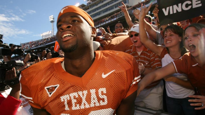 2003-2005: UT quarterback Vince Young celebrates with the fans after beating OU 45-12 at the Red River Rivalry at the Cotton Bowl in Dallas on Sat. Oct. 8, 2005.