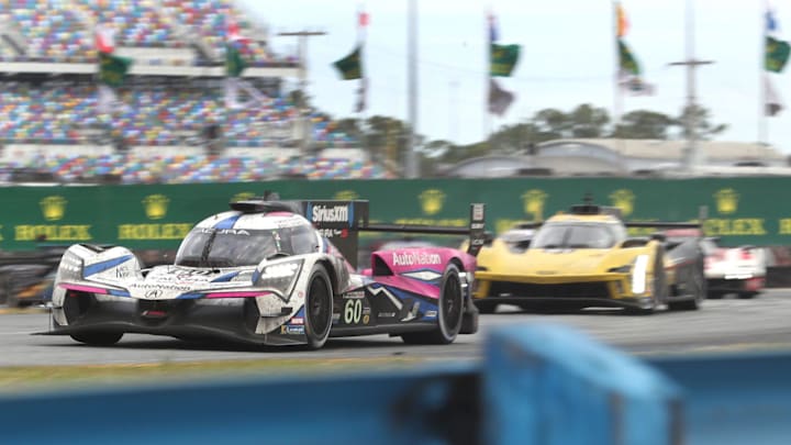 The no. 60- Acura ARX-06 is chased by the no. 01 Cadillac LMDh in the east horseshoe, Sunday January 29, 2023 during the Rolex 24 at Daytona International Speedway

Dtb Rolex Sunday Action 1