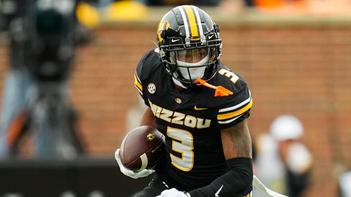 Nov 11, 2023; Columbia, Missouri, USA; Missouri Tigers wide receiver Luther Burden III (3) runs with the ball during the first half against the Tennessee Volunteers at Faurot Field at Memorial Stadium. Mandatory Credit: Jay Biggerstaff-USA TODAY Sports