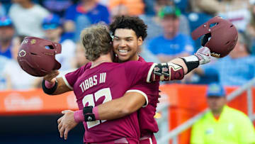 Florida State   s James Gibbs III is congratulated by Florida State   s Cam Smith (24) after Gibbs his a three run homer in the top of the fourth making it 7-0 FSU. The Florida Gators hosted Florida Sate Seminoles at Condron Ballpark in Gainesville, FL on Tuesday, March 12, 2024. Florida State defeated Florida 12-8. [Doug Engle/Gainesville Sun]