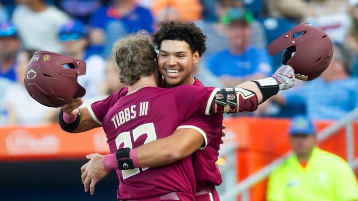 Florida State   s James Gibbs III is congratulated by Florida State   s Cam Smith (24) after Gibbs his a three run homer in the top of the fourth making it 7-0 FSU. The Florida Gators hosted Florida Sate Seminoles at Condron Ballpark in Gainesville, FL on Tuesday, March 12, 2024. Florida State defeated Florida 12-8. [Doug Engle/Gainesville Sun]