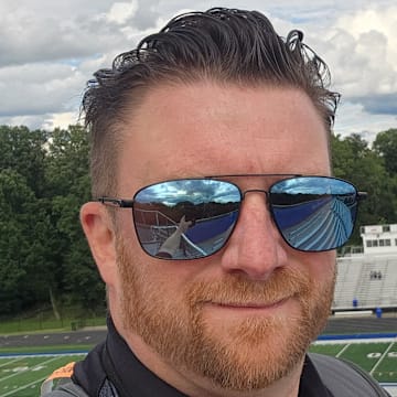 Ryan Isley gets ready to cover the girls soccer game between Brunswick and Walsh Jesuit on August 25, 2025. 