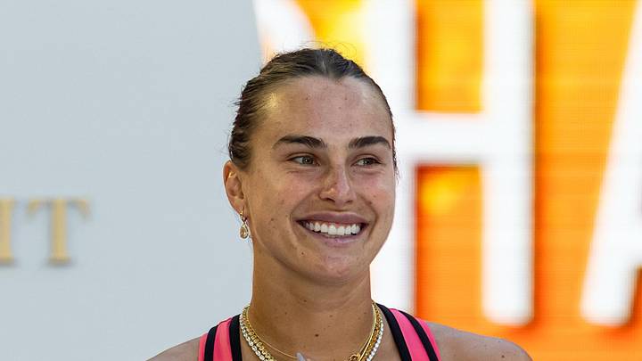 Aryna Sabalenka smiles after a match