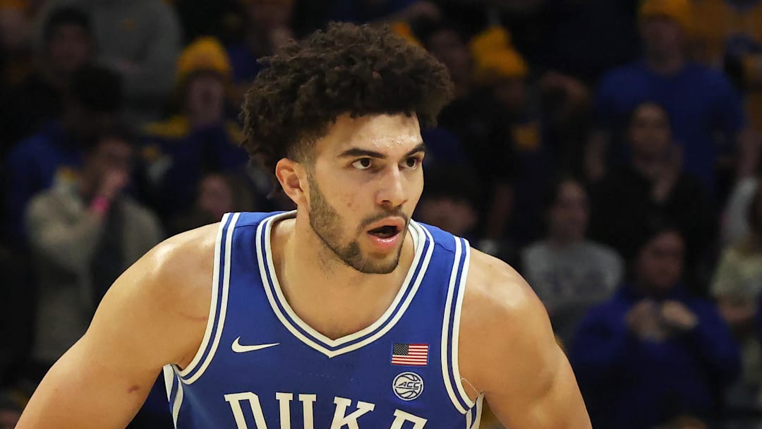 Feb 10, 2026; Pittsburgh, Pennsylvania, USA;  Duke Blue Devils forward Cameron Boozer (12) handles the ball against the Pittsburgh Panthers during the first half at Petersen Events Center. Mandatory Credit: Charles LeClaire-Imagn Images