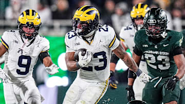 Michigan running back Jordan Marshall (23) runs against Michigan State during the second half at Spartan Stadium in East Lansing on Saturday, October 25, 2025.