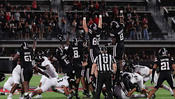 Sep 28, 2024; Lubbock, Texas, USA;  The Texas Tech Red Raiders defensive attempt to block a field goal in the second half in the game against the Cincinnati Bearcats at Jones AT&T Stadium and Cody Campbell Field. Mandatory Credit: Michael C. Johnson-Imagn Images