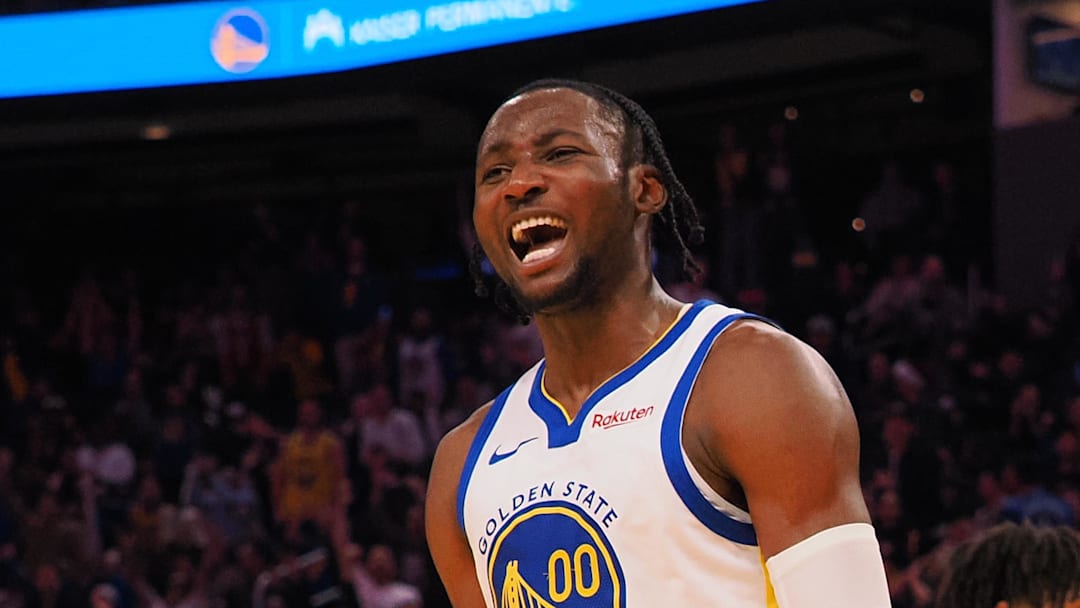 Dec 6, 2023; San Francisco, California, USA; Golden State Warriors forward Jonathan Kuminga (00) reacts after a dunk against the Portland Trail Blazers during the fourth quarter at Chase Center. Mandatory Credit: Kelley L Cox-Imagn Images