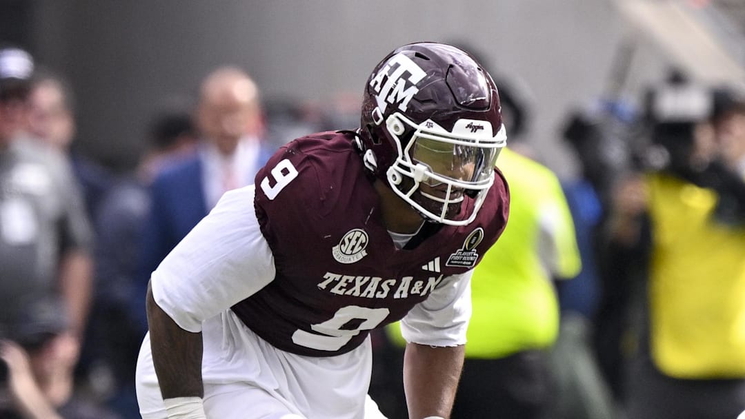 Dec 20, 2025; College Station, TX, USA; Texas A&M Aggies defensive end Cashius Howell (9) lines up during the game between the Aggies and the Hurricanes at Kyle Field. Mandatory Credit: Jerome Miron-Imagn Images
