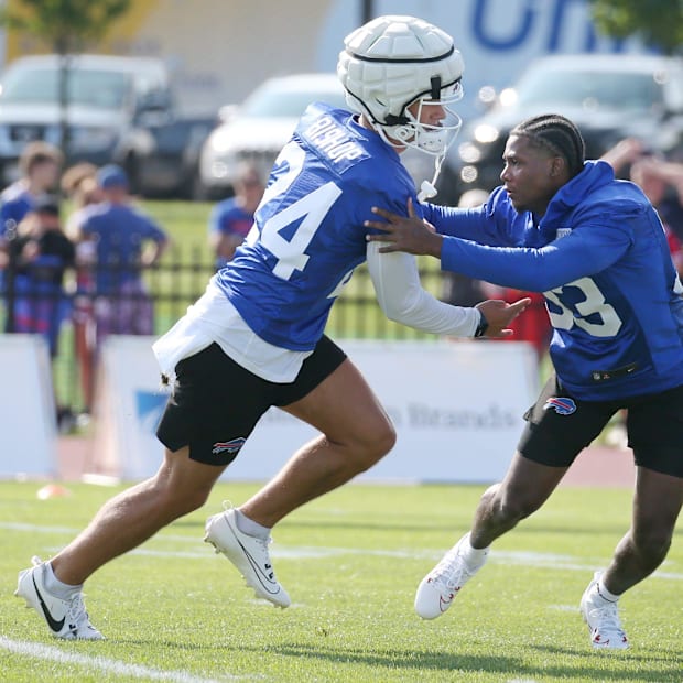 defensive backs Cole Bishop, left, and Te'Cory Couch