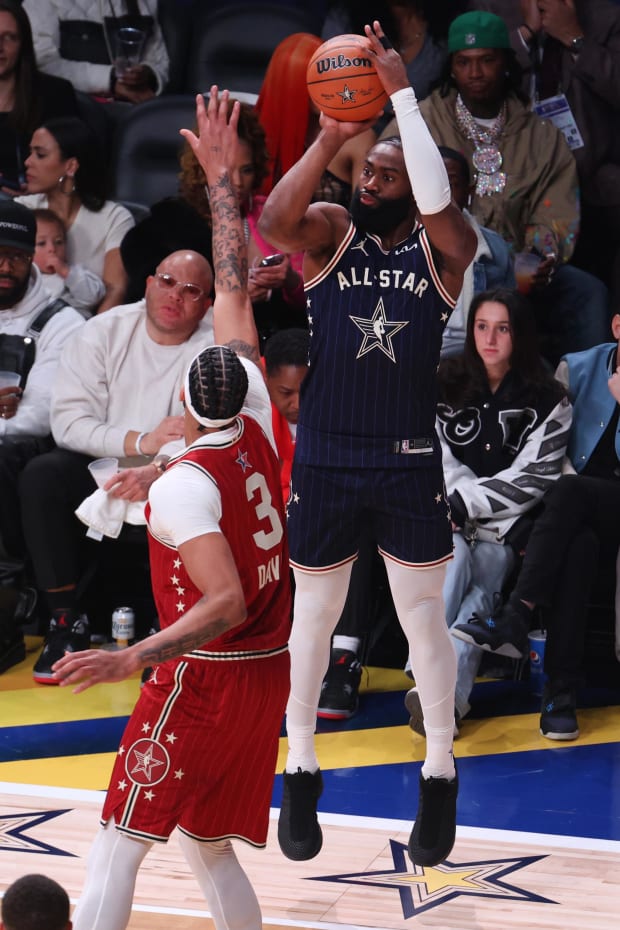 Jaylen Brown of the Boston Celtics shoots the ball over Los Angeles Lakers forward Anthony Davis at the NBA All-Star Game.