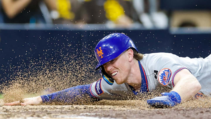 Jul 29, 2025; San Diego, California, USA; New York Mets second baseman Brett Baty (7) scores a run during the fifth inning against the San Diego Padres at Petco Park. Mandatory Credit: David Frerker-Imagn Images