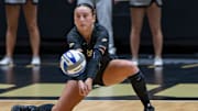 Purdue Sophomore Ryan McAleer (3) digs a ball