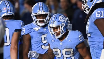 Nov 11, 2023; Chapel Hill, North Carolina, USA; North Carolina Tar Heels running back Omarion Hampton (28) with wide receiver Devontez Walker (9) after scoring a touchdown in the fourth quarter at Kenan Memorial Stadium. Mandatory Credit: Bob Donnan-USA TODAY Sports