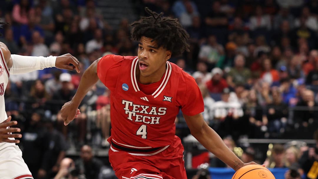 Mar 22, 2026; Tampa, FL, USA; Texas Tech Red Raiders guard Christian Anderson (4) dribbles the ball against Alabama Crimson Tide guard Latrell Wrightsell Jr. (3) in the first half during a second round game of the men's 2026 NCAA Tournament at Benchmark International Arena. Mandatory Credit: Nathan Ray Seebeck-Imagn Images